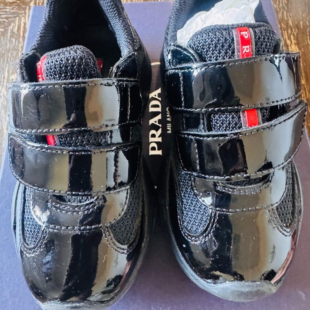 Prada Kids Black Patent Leather Sneakers with Red Accents